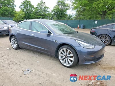 Czwarte zdjęcie samochodu z boku: 2019 TESLA 3 VIN:5YJ3E1EA5KF407662 - miniatura