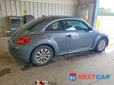 Trzecie zdjęcie samochodu z tyłu: 2016 VOLKSWAGEN BEETLE 1.8T VIN:3VWF17AT8GM602187 - miniatura