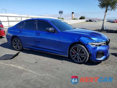 Czwarte zdjęcie samochodu z boku: 2022 BMW M340XI VIN:WBA5U9C09NFL70780 - miniatura
