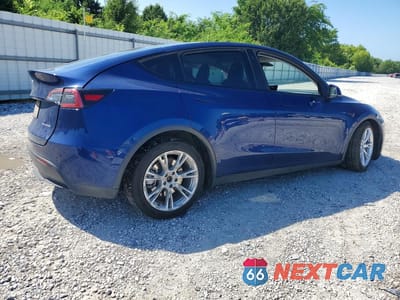 Trzecie zdjęcie samochodu z tyłu: 2023 TESLA MODEL Y VIN:7SAYGAEE9PF769748 - miniatura