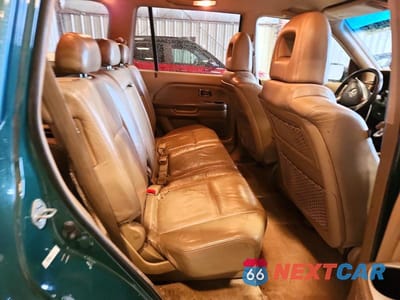 Zdjęcie 11 z 13 samochodu: 2003 HONDA PILOT EXL VIN:2HKYF18643H503974 - miniatura