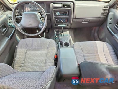 Zdjęcie 8 z 12 samochodu: 2001 JEEP CHEROKEE SPORT VIN:1J4FF48S71L536184 - miniatura