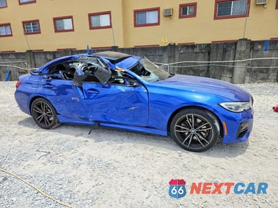 Czwarte zdjęcie samochodu z boku: 2021 BMW 330E VIN:3MW5P7J01M8B77738 - miniatura