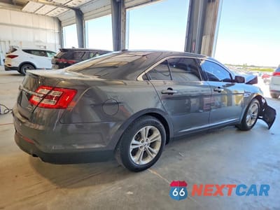 Trzecie zdjęcie samochodu z tyłu: 2016 FORD TAURUS SEL VIN:1FAHP2E85GG131800 - miniatura