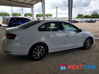 Trzecie zdjęcie samochodu z tyłu: 2017 VOLKSWAGEN JETTA SE VIN:3VWDB7AJ0HM413604 - miniatura