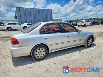 Trzecie zdjęcie samochodu z tyłu: 1999 HONDA CIVIC LX VIN:1HGEJ6670XL015490 - miniatura