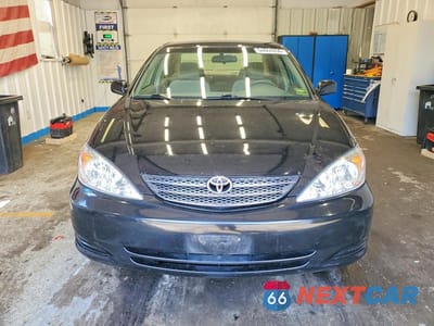 Piąte zdjęcie samochodu w środku: 2003 TOYOTA CAMRY LE VIN:4T1BE32K13U200646 - miniatura