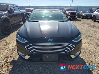Piąte zdjęcie samochodu w środku: 2017 FORD FUSION SE VIN:3FA6P0H9XHR284313 - miniatura