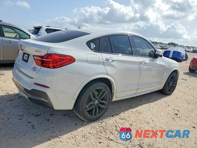Trzecie zdjęcie samochodu z tyłu: 2016 BMW X4 XDRIVE35I VIN:5UXXW5C5XG0N91920 - miniatura