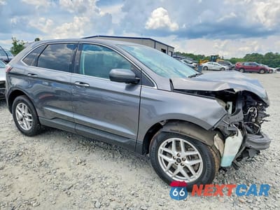 Czwarte zdjęcie samochodu z boku: 2023 FORD EDGE SEL VIN:2FMPK4J92PBA30151 - miniatura