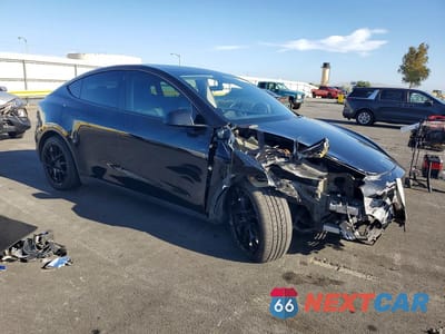 Czwarte zdjęcie samochodu z boku: 2021 TESLA MODEL Y VIN:5YJYGDEEXMF272637 - miniatura