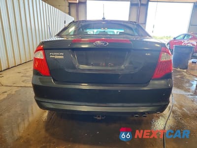 Zdjęcie 6 z 12 samochodu: 2010 FORD FUSION SE VIN:3FAHP0HA5AR285717 - miniatura