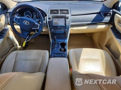 Zdjęcie 8 z 12 samochodu: 2016 TOYOTA CAMRY HYBRID XLE VIN:4T1BD1FK2GU177904 - miniatura