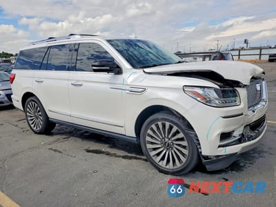Czwarte zdjęcie samochodu z boku: 2018 LINCOLN NAVIGATOR RESERVE VIN:5LMJJ2LT3JEL16976 - miniatura