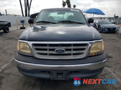 Piąte zdjęcie samochodu w środku: 2000 FORD F150 VIN:1FTZX1721YKB23838 - miniatura