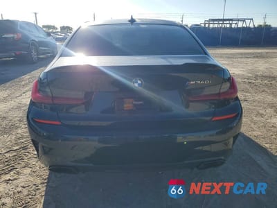 Zdjęcie 6 z 12 samochodu: 2021 BMW M340I VIN:3MW5U7J03M8B52056 - miniatura