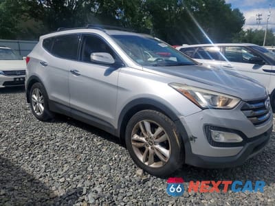 Czwarte zdjęcie samochodu z boku: 2014 HYUNDAI SANTA FE SPORT 2.0T VIN:5XYZU3LA0EG150919 - miniatura