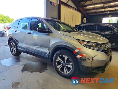 Czwarte zdjęcie samochodu z boku: 2018 HONDA CR-V LX VIN:2HKRW6H3XJH201321 - miniatura