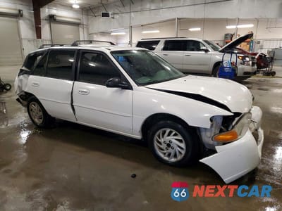 Czwarte zdjęcie samochodu z boku: 1997 FORD ESCORT LX VIN:3FALP15P8VR163710 - miniatura