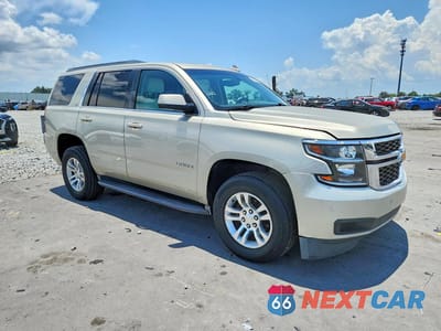 Czwarte zdjęcie samochodu z boku: 2016 CHEVROLET TAHOE C1500 LS VIN:1GNSCAEC8GR394403 - miniatura