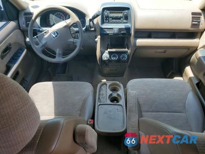 Zdjęcie 8 z 13 samochodu: 2002 HONDA CR-V LX VIN:JHLRD68492C014280 - miniatura