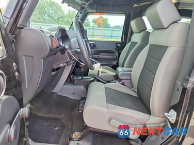 Zdjęcie 7 z 13 samochodu: 2010 JEEP WRANGLER SPORT VIN:1J4AA2D1XAL112136 - miniatura