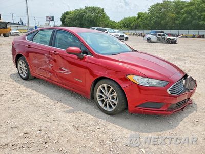 Czwarte zdjęcie samochodu z boku: 2017 FORD FUSION SE HYBRID VIN:3FA6P0LU7HR386633 - miniatura