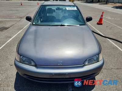 Piąte zdjęcie samochodu w środku: 1995 HONDA CIVIC DX VIN:1HGEG8642SL012356 - miniatura
