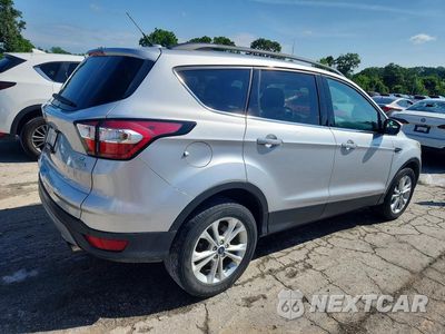 Trzecie zdjęcie samochodu z tyłu: 2017 FORD ESCAPE SE VIN:1FMCU0GD9HUC94623 - miniatura