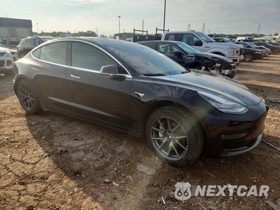 Czwarte zdjęcie samochodu z boku: 2019 TESLA MODEL 3 VIN:5YJ3E1EB0KF359349 - miniatura