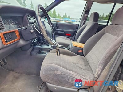 Zdjęcie 7 z 13 samochodu: 1998 JEEP GRAND CHEROKEE LAREDO VIN:1J4GZ58SXWC372695 - miniatura