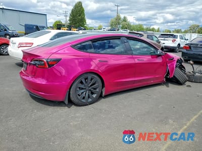 Trzecie zdjęcie samochodu z tyłu: 2023 TESLA MODEL 3 VIN:5YJ3E1EA1PF475478 - miniatura