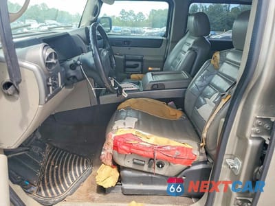 Zdjęcie 7 z 12 samochodu: 2003 HUMMER H2 VIN:5GRGN23UX3H145531 - miniatura