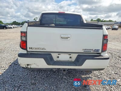 Zdjęcie 6 z 12 samochodu: 2014 HONDA RIDGELINE RTL-S VIN:5FPYK1F6XEB014048 - miniatura