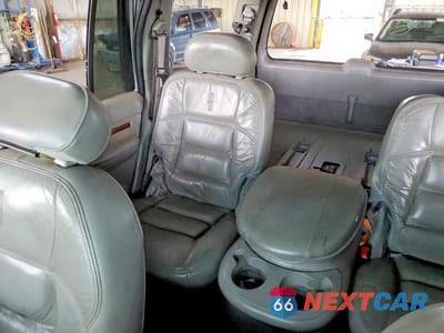 Zdjęcie 10 z 13 samochodu: 2000 LINCOLN NAVIGATOR VIN:5LMRU27A2YLJ00349 - miniatura