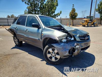 Czwarte zdjęcie samochodu z boku: 2003 MAZDA TRIBUTE ES VIN:4F2CZ06133KM34876 - miniatura
