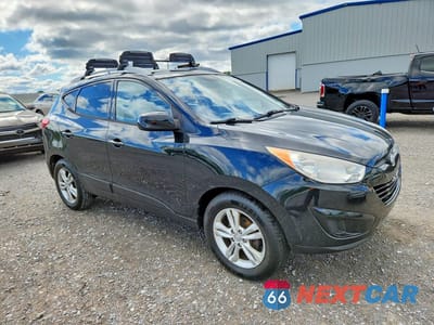 Czwarte zdjęcie samochodu z boku: 2011 HYUNDAI TUCSON GLS VIN:KM8JU3AC4BU285781 - miniatura