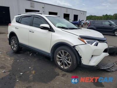 Czwarte zdjęcie samochodu z boku: 2018 TOYOTA RAV4 LIMITED VIN:JTMYFREV2JJ205955 - miniatura