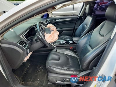 Zdjęcie 7 z 12 samochodu: 2014 FORD FUSION TITANIUM VIN:3FA6P0D93ER194082 - miniatura