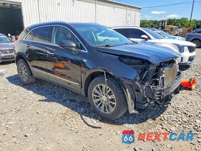 Czwarte zdjęcie samochodu z boku: 2018 CADILLAC XT5 LUXURY VIN:1GYKNCRS3JZ134749 - miniatura