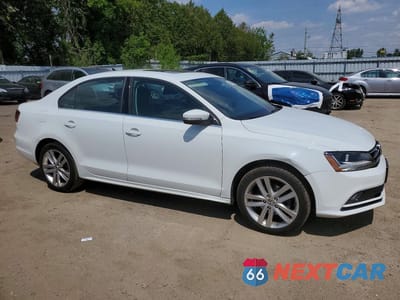 Czwarte zdjęcie samochodu z boku: 2017 VOLKSWAGEN JETTA SEL VIN:3VWL17AJ5HM312265 - miniatura