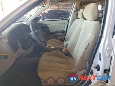 Zdjęcie 7 z 12 samochodu: 2003 HYUNDAI ELANTRA GLS VIN:KMHDN45D43U566788 - miniatura