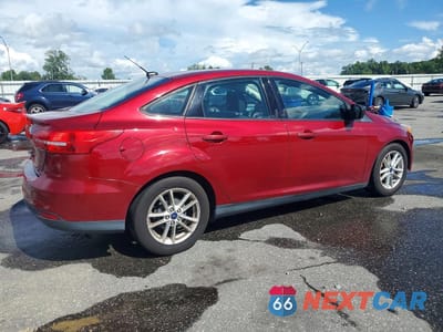 Trzecie zdjęcie samochodu z tyłu: 2016 FORD FOCUS SE VIN:1FADP3F25GL389417 - miniatura