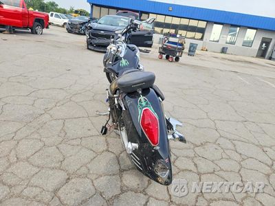 Czwarte zdjęcie samochodu z boku: 2004 HONDA VT1300 S VIN:1HFSC52014A100351 - miniatura