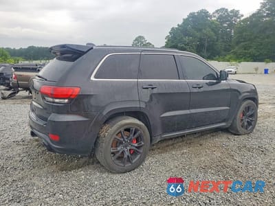 Trzecie zdjęcie samochodu z tyłu: 2014 JEEP GRAND CHEROKEE SRT-8 VIN:1C4RJFDJ0EC169581 - miniatura