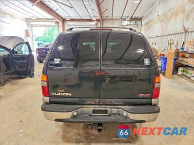 Zdjęcie 6 z 13 samochodu: 2000 GMC YUKON VIN:1GKEK13T9YJ196106 - miniatura