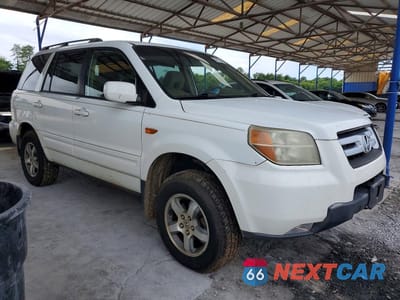 Czwarte zdjęcie samochodu z boku: 2007 HONDA PILOT EX VIN:5FNYF18427B017554 - miniatura