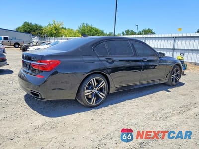 Trzecie zdjęcie samochodu z tyłu: 2016 BMW 740 I VIN:WBA7E2C58GG547440 - miniatura