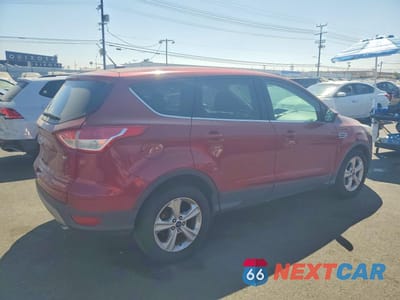 Trzecie zdjęcie samochodu z tyłu: 2016 FORD ESCAPE SE VIN:1FMCU0G71GUB60827 - miniatura