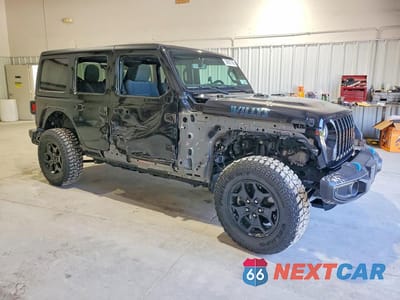 Czwarte zdjęcie samochodu z boku: 2023 JEEP WRANGLER 4XE VIN:1C4JJXN63PW605225 - miniatura